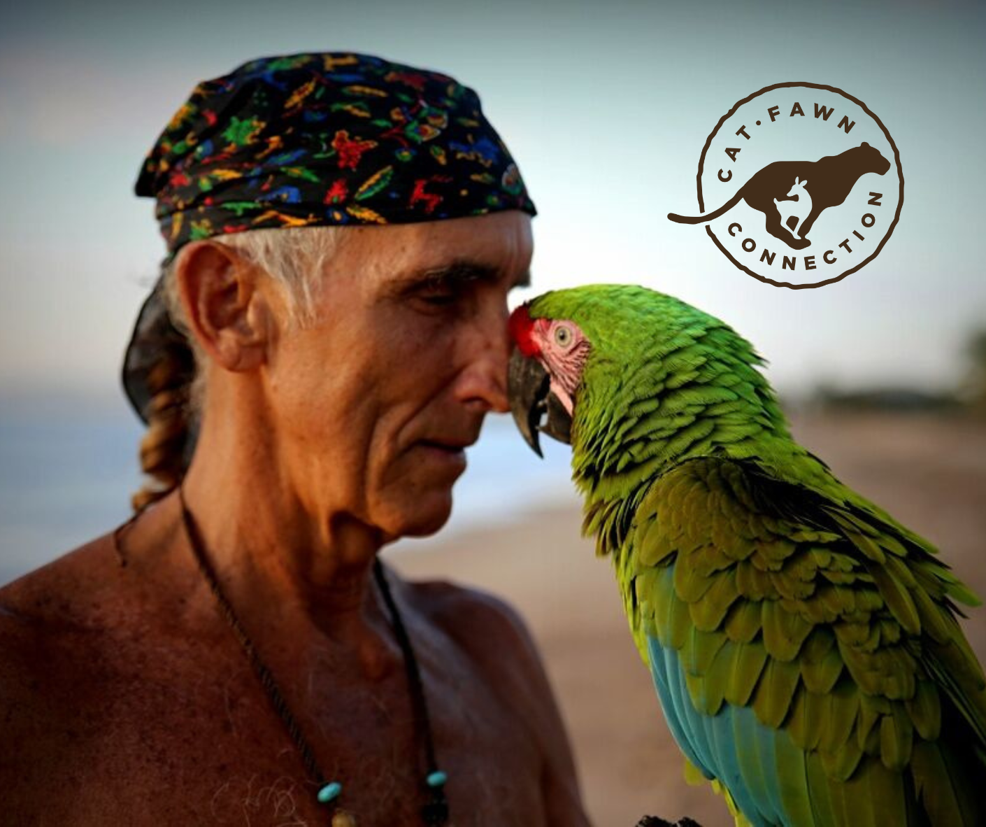 Four Arrows with a parrot, his feathered companion Paco.
